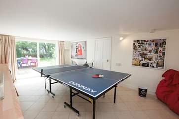 On the lower ground floor is a brillant games-room with ping-pong table. Best of three anyone?