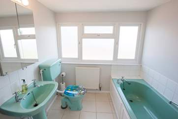The master bedroom's en suite bathroom is the parents private space for a relaxing soak with some peace and quiet.