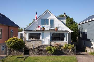 Tides Reach is a fabulous four bedroom property, with unbeatable sea views, games-room and beautiful garden.