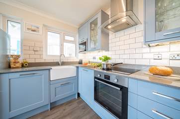 Cook up a family favourite in the well-equipped kitchen.