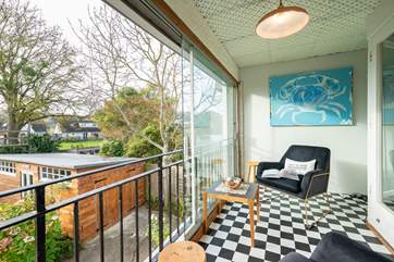 Take a moment to yourself in the sun-room. Grab a good book and coffee in hand and simply relax.