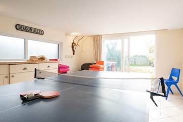 The lower-ground floor offers a fun-filled games room.