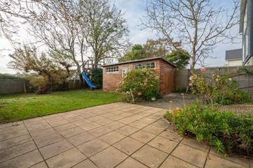 The enclosed garden has a treehouse and slide for the children. Please supervise at all times. The steps to the treehouse landing are steep.