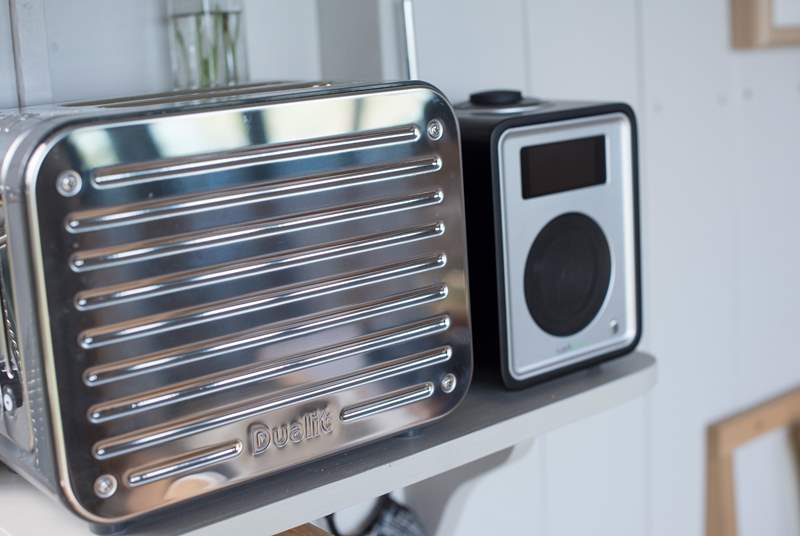 A Dualit toaster and DAB radio are provided.