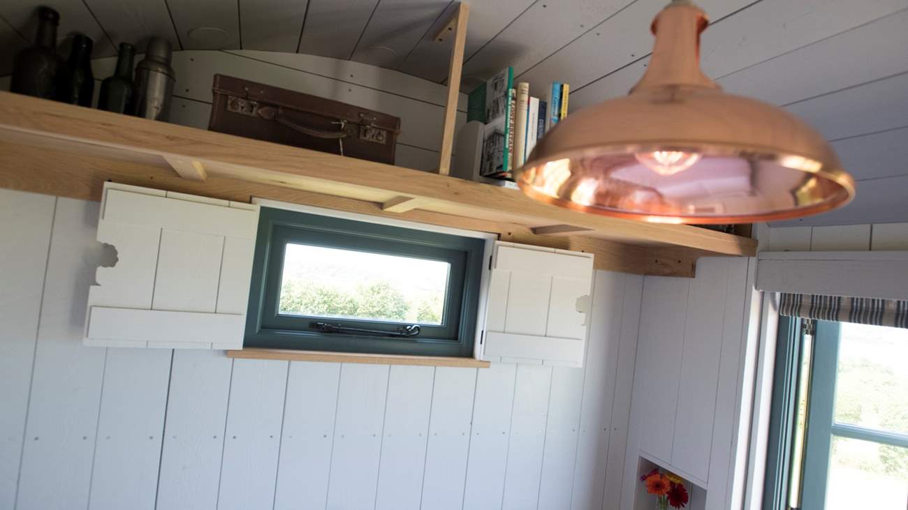 This cute window is revealed when the table is converted into a bed.