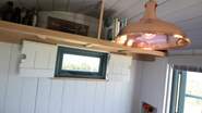 This cute window is revealed when the table is converted into a bed.