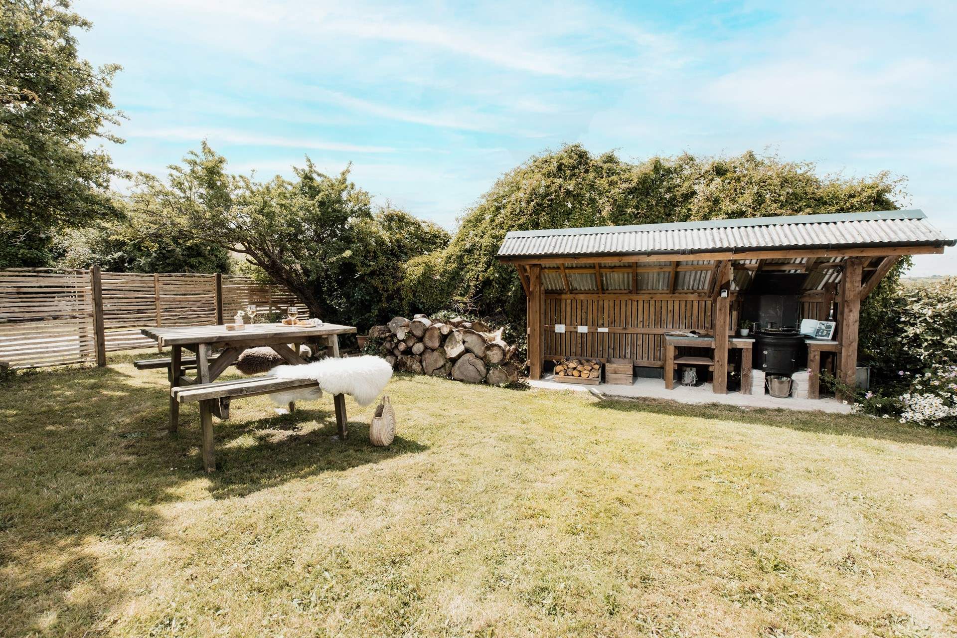 The covered BBQ hut is perfect for those evening delights. 