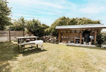 The covered BBQ hut is perfect for those evening delights. 