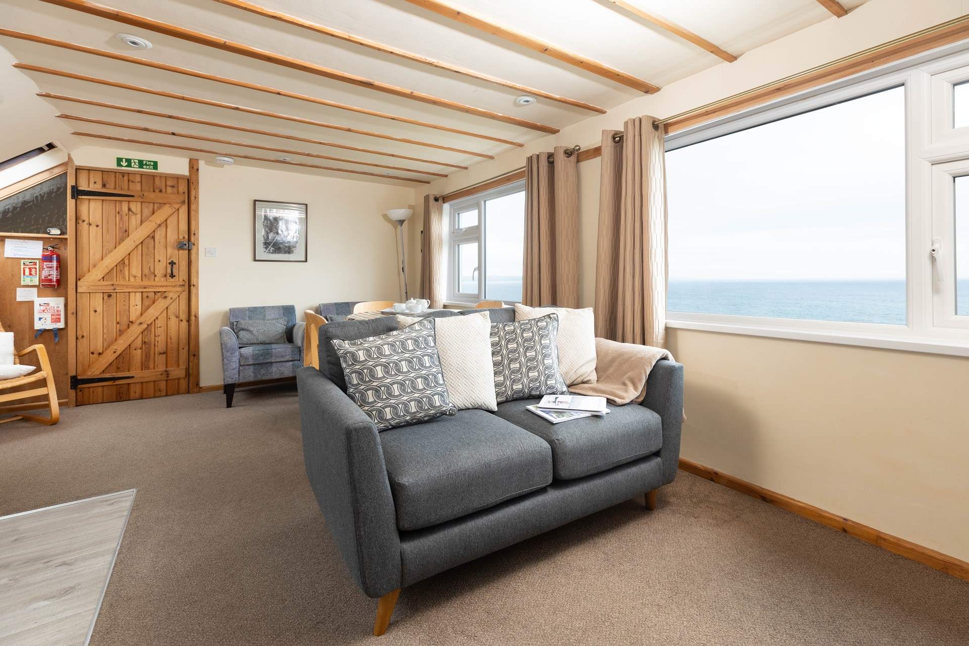 The seating area - gorgeous views from here with the dining-table behind.