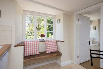 The kitchen has a window seat too and the view is down towards the heart of the village and the church.