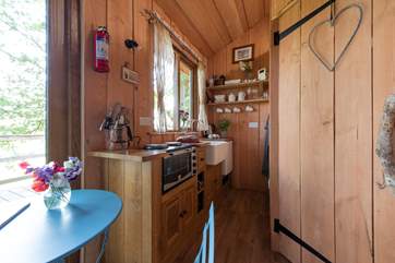 There is a compact but well-equipped kitchen-area.