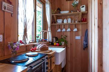 There is a compact but well-equipped kitchen.