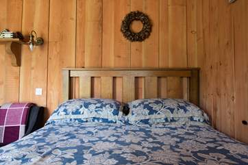 The hand-made king-size bed, perfect for returning to after a day out and about.