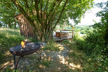 A fire-pit BBQ is provided for your use.
