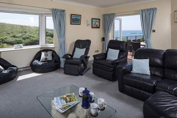 Huge sitting-room opens out onto the decked area. Perfect for those large family/group occasions.
