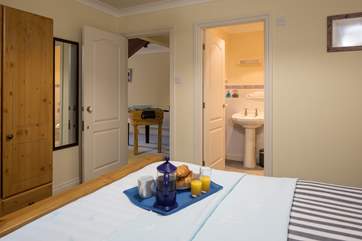 En suite to bedroom 2 comprises of a shower cubicle. Perfect for washing sandy toes after a day on the beach.