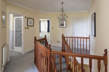 Upstairs landing area which leads into all first floor rooms.