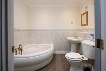 En suite to master bedroom. Comprises of a bath and a shower cubicle.
