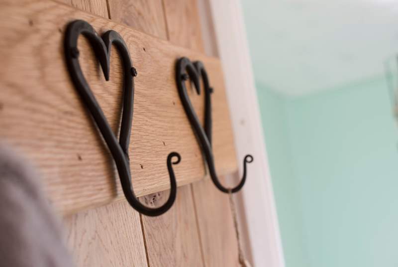 Handy hooks on the bathroom door.