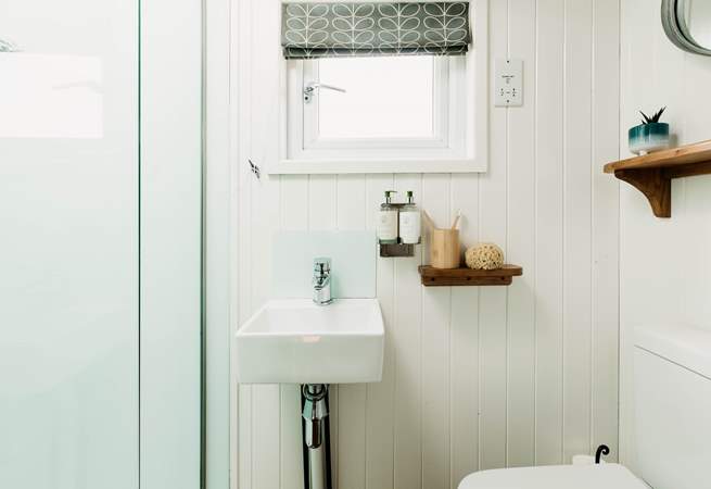 At the end of the hut you’ll find a shower room with WC