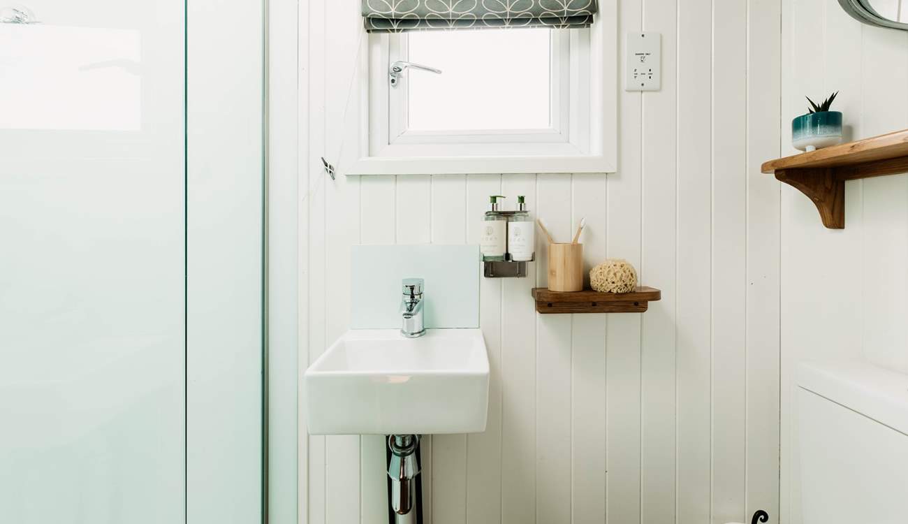 At the end of the hut you’ll find a shower room with WC