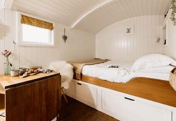 Cocoon yourself in the king-sized bed