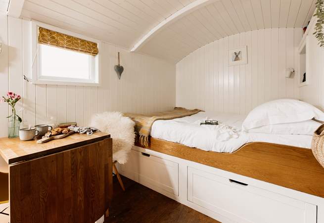 Cocoon yourself in the king-sized bed
