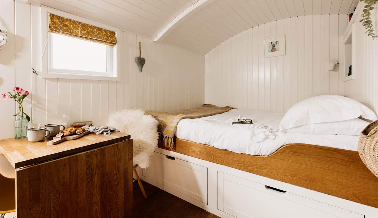 Cocoon yourself in the king-sized bed