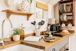 Cook up a feast in the charming kitchen