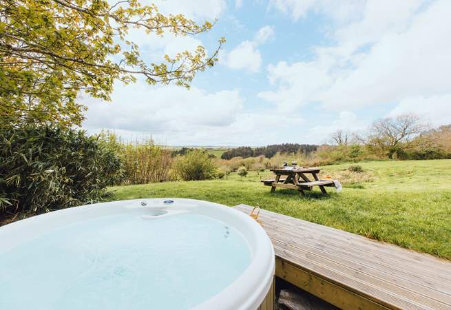 Slip into the soothing bubbles of the hot tub