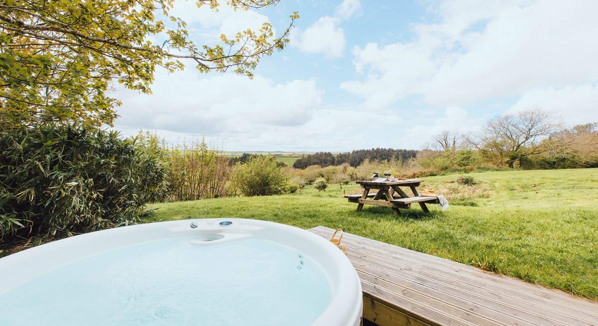 Slip into the soothing bubbles of the hot tub