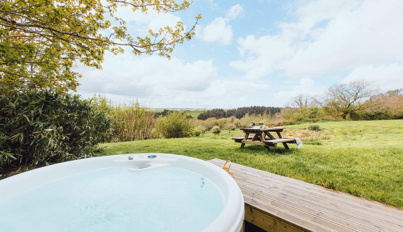 Slip into the soothing bubbles of the hot tub