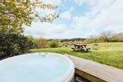 Slip into the soothing bubbles of the hot tub