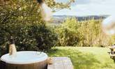 Complete with a bubbling hot tub to relax after a day of exploring.  - Thumbnail Image