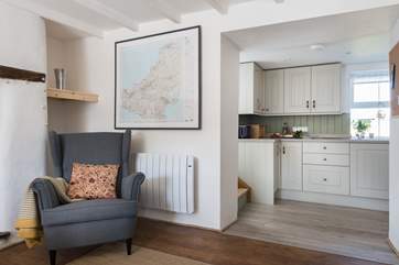 There's an open archway from the dining-room through to the kitchen.