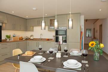 Although open plan, the kitchen/dining-area sits separate to the sitting-area giving the best of both worlds.
