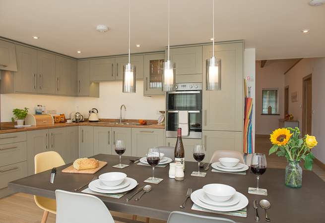 Although open plan, the kitchen/dining-area sits separate to the sitting-area giving the best of both worlds.
