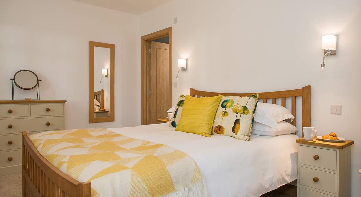 Bedroom 1 with its king-size double bed has been decorated in beautiful soft, restful colours.