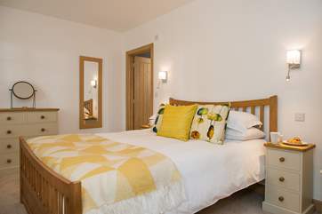 Bedroom 1 with its king-size double bed has been decorated in beautiful soft, restful colours.