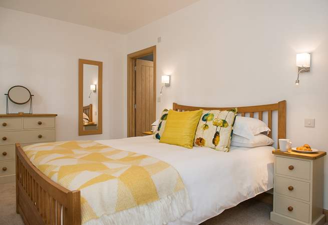 Bedroom 1 with its king-size double bed has been decorated in beautiful soft, restful colours.
