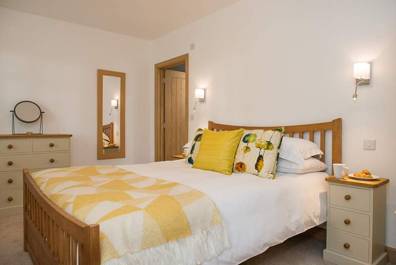Bedroom 1 with its king-size double bed has been decorated in beautiful soft, restful colours.