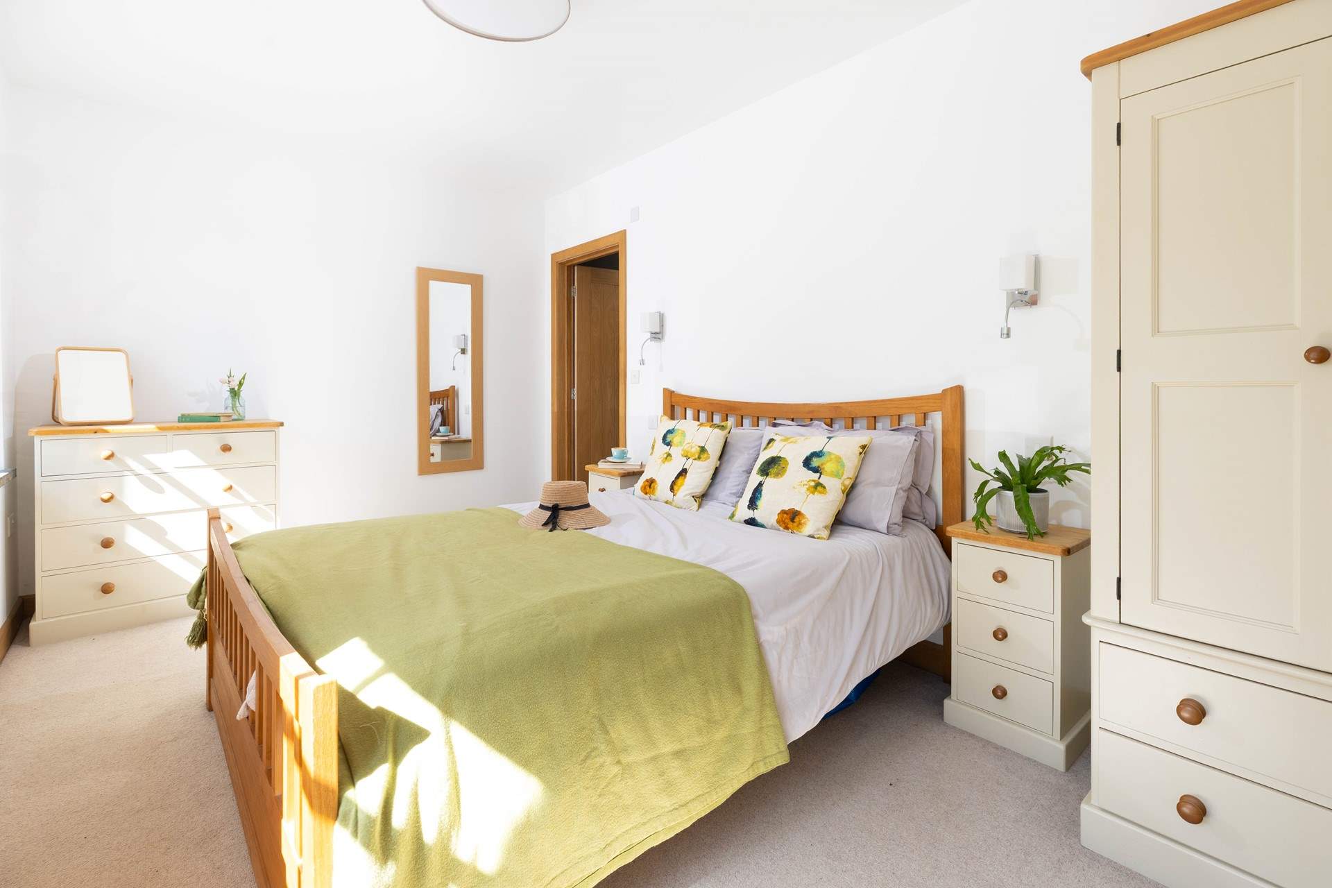 This bedroom is light and airy. 