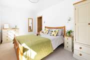This bedroom is light and airy.