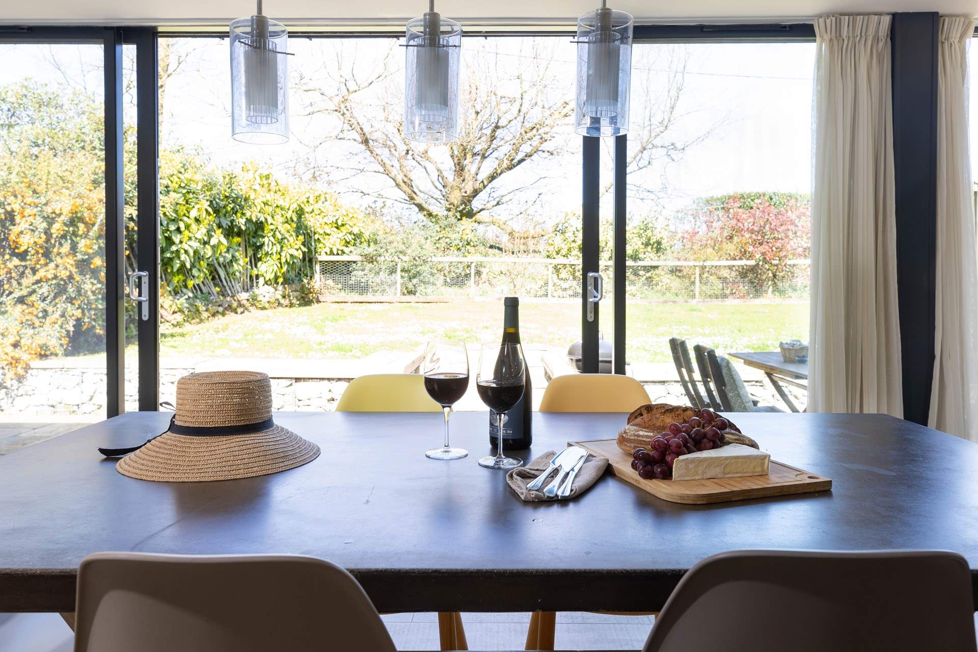 Sliding doors open to the patio and garden from the kitchen/ diner. 