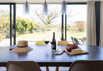 Sliding doors open to the patio and garden from the kitchen/ diner. 