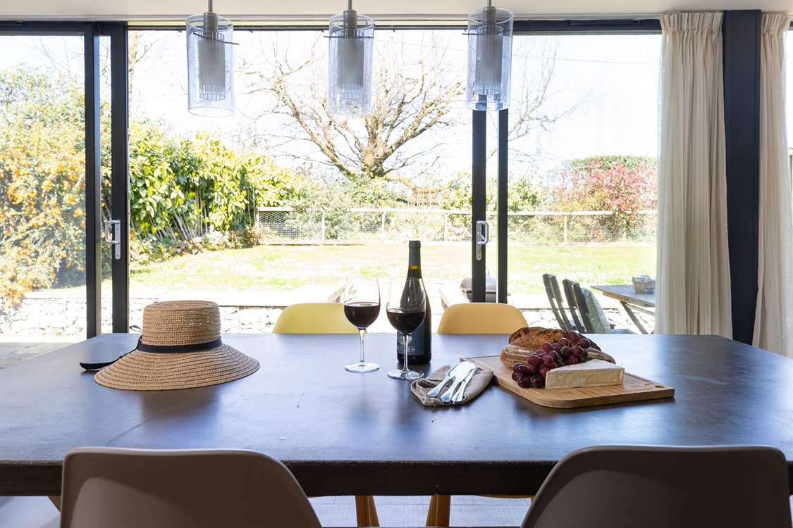 Sliding doors open to the patio and garden from the kitchen/ diner.
