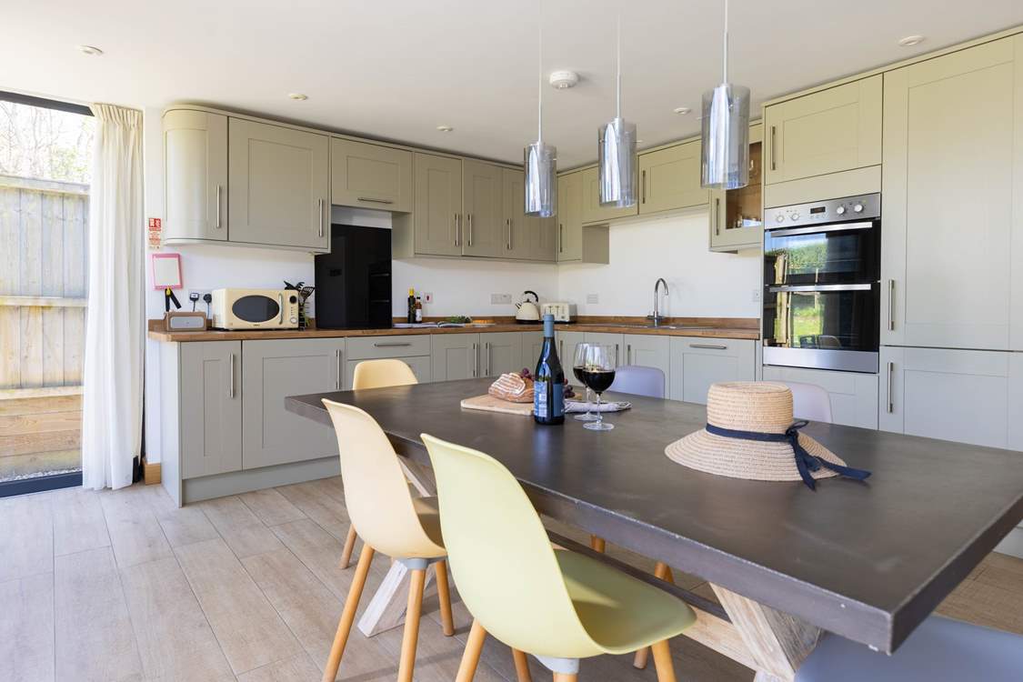 The large kitchen/ diner is a lovely space to spend time together.