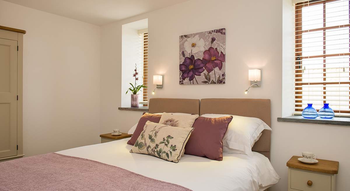 Both bedrooms have super comfy mattresses, crisp white linens, soft throws and plump cushions!