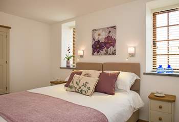 Both bedrooms have super comfy mattresses, crisp white linens, soft throws and plump cushions!