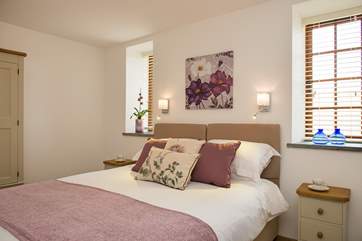 Both bedrooms have super comfy mattresses, crisp white linens, soft throws and plump cushions!